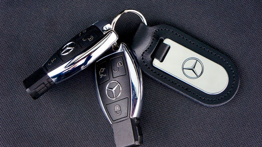 Close-up of car keys with a keychain